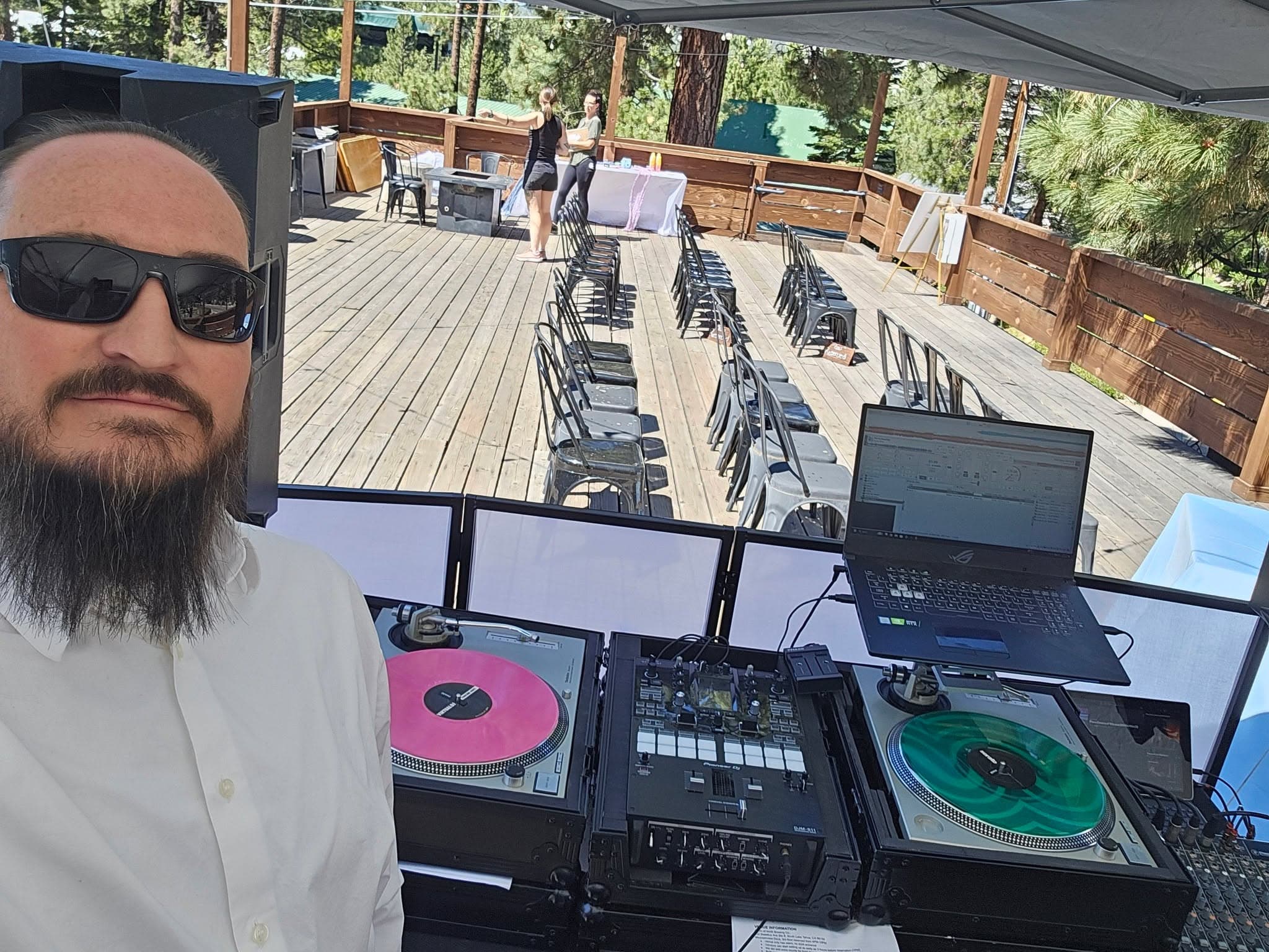 Wedding DJ setup with Pioneer DJM-S11 mixer and two Technics SL-1200 turntables